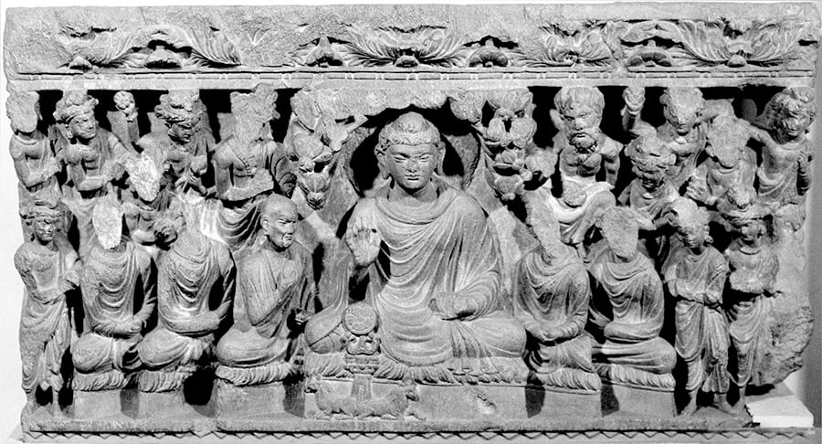 Image of the Buddha's first sermon from Pakistan, in The Art of Buddhism